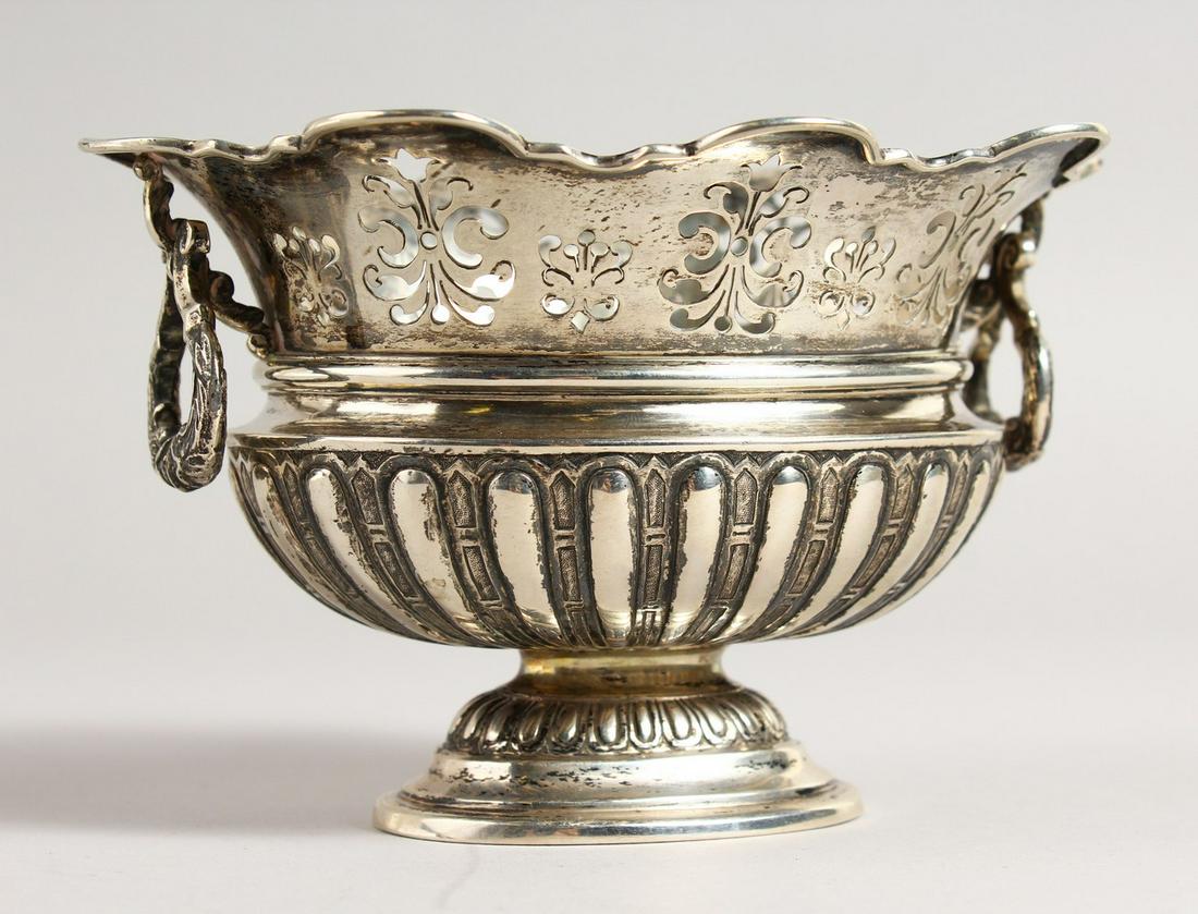 A FRENCH SILVER TWO-HANDLED PEDESTAL VASE. 5.5ins: A FRENCH SILVER TWO-HANDLED PEDESTAL VASE. 5.5ins long.