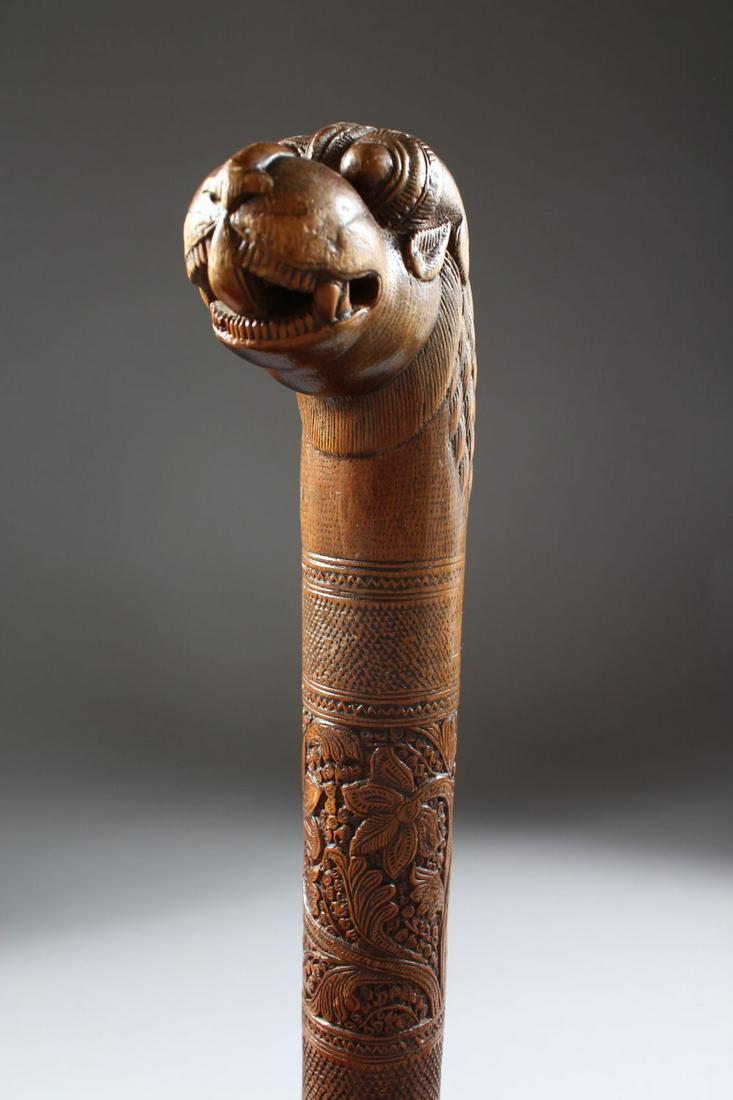 A 19TH CENTURY INDIAN CARVED SANDAL WOOD MAYSORE: A 19TH CENTURY INDIAN CARVED SANDAL WOOD MAYSORE WALKING STICK, 87cm.