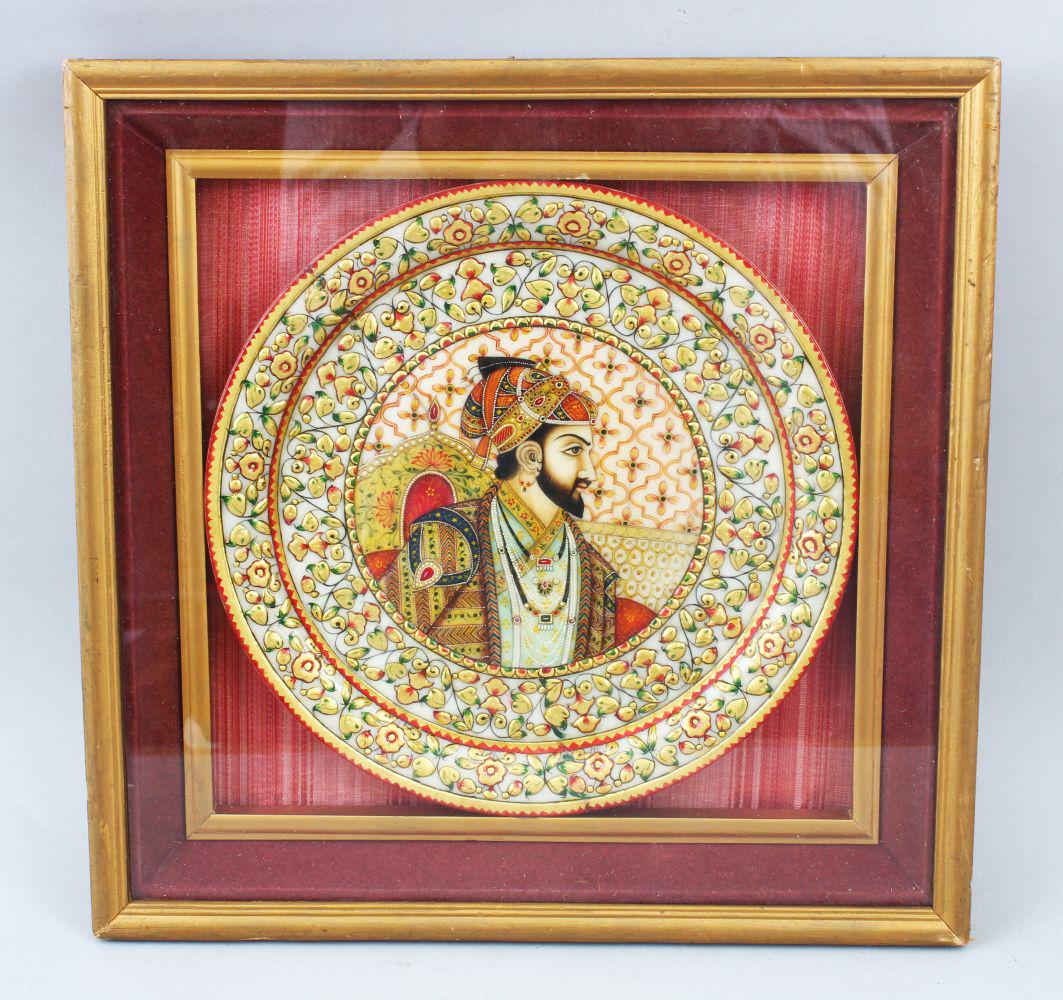 A MUGHAL PLATE, painted with a portrait of a Ruler,: A MUGHAL PLATE, painted with a portrait of a Ruler, framed and glazed, plate 22.5cm diameter.