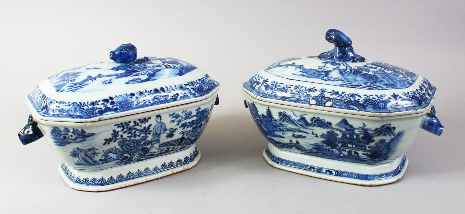 TWO 19TH CENTURY CHINESE BLUE & WHITE PORCELAIN TUREENS: TWO 19TH CENTURY CHINESE BLUE & WHITE PORCELAIN TUREENS AND COVERS, painted with fisherman and a female figure in a garden setting, with fruit formed finials, 35cm wide x 19.5cm high