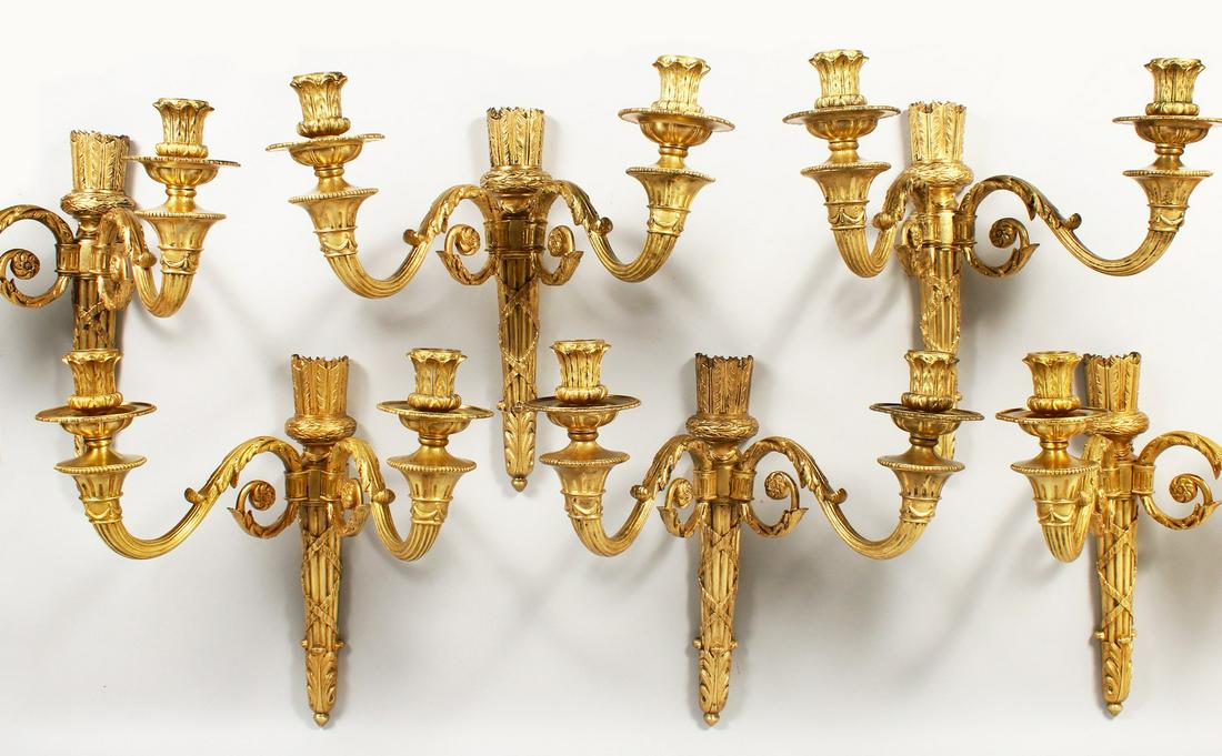 AN IMPORTANT SET OF SIX ORMOLU TWO LIGHT WALL SCONCES: AN IMPORTANT SET OF SIX ORMOLU TWO LIGHT WALL SCONCES by FRANCOIS LINKE, all signed F. Linke, all with acanthus and scrolls. 18ins long x 16ins wide.