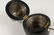 AN EBONISED PEAR SHAPED TEA CADDY. 7ins high. - 2