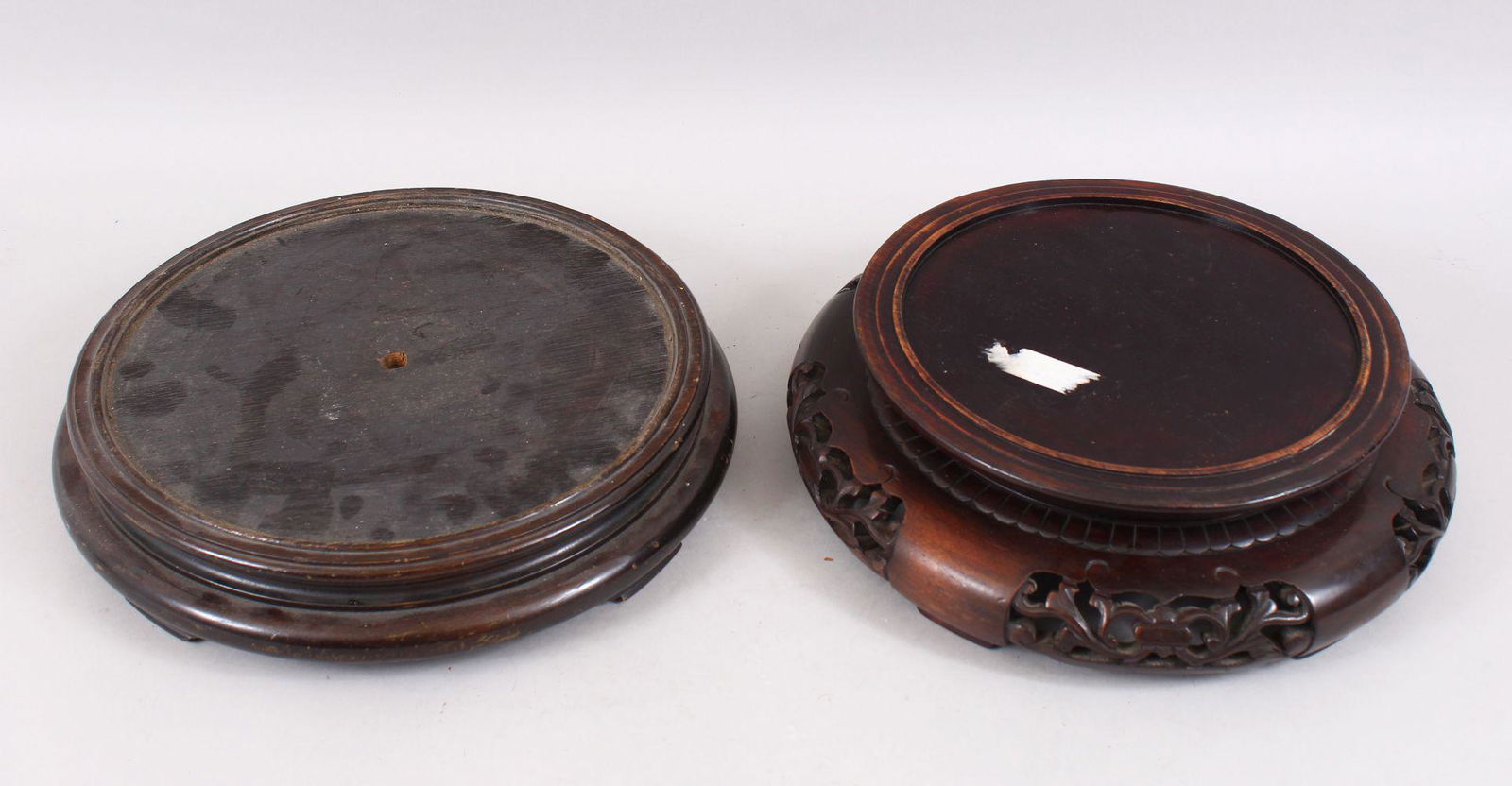 TWO CHINESE CARVED HARDWOOD CIRCULAR STANDS, for vases (1 of 1)