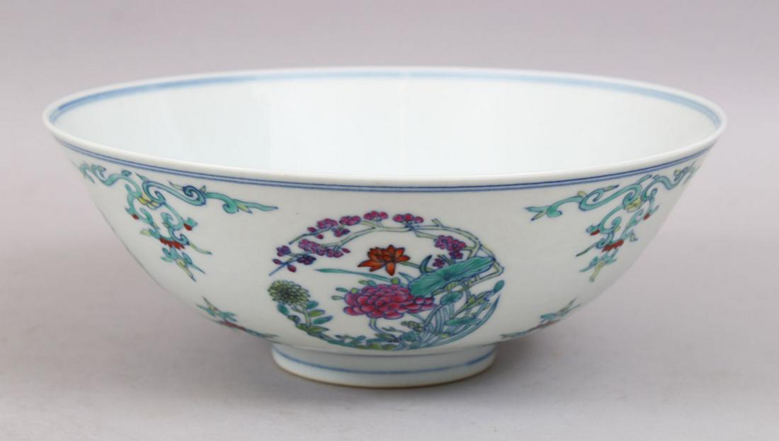 A LARGE CHINESE DOUCAI PORCELAIN BOWL, decorated with (1 of 7)