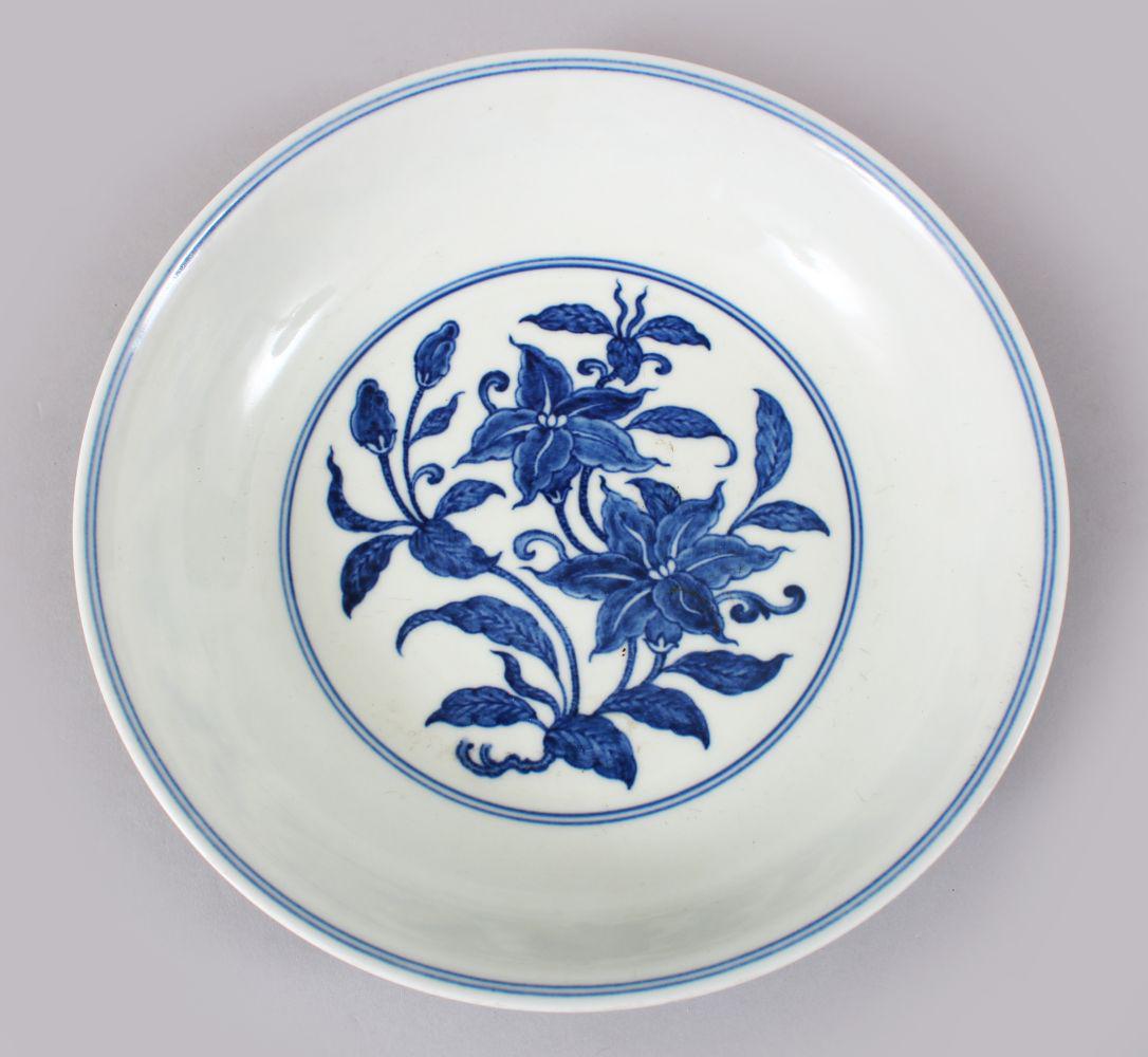 A CHINESE BLUE & WHITE PORCELAIN FLORAL DISH, the (1 of 4)