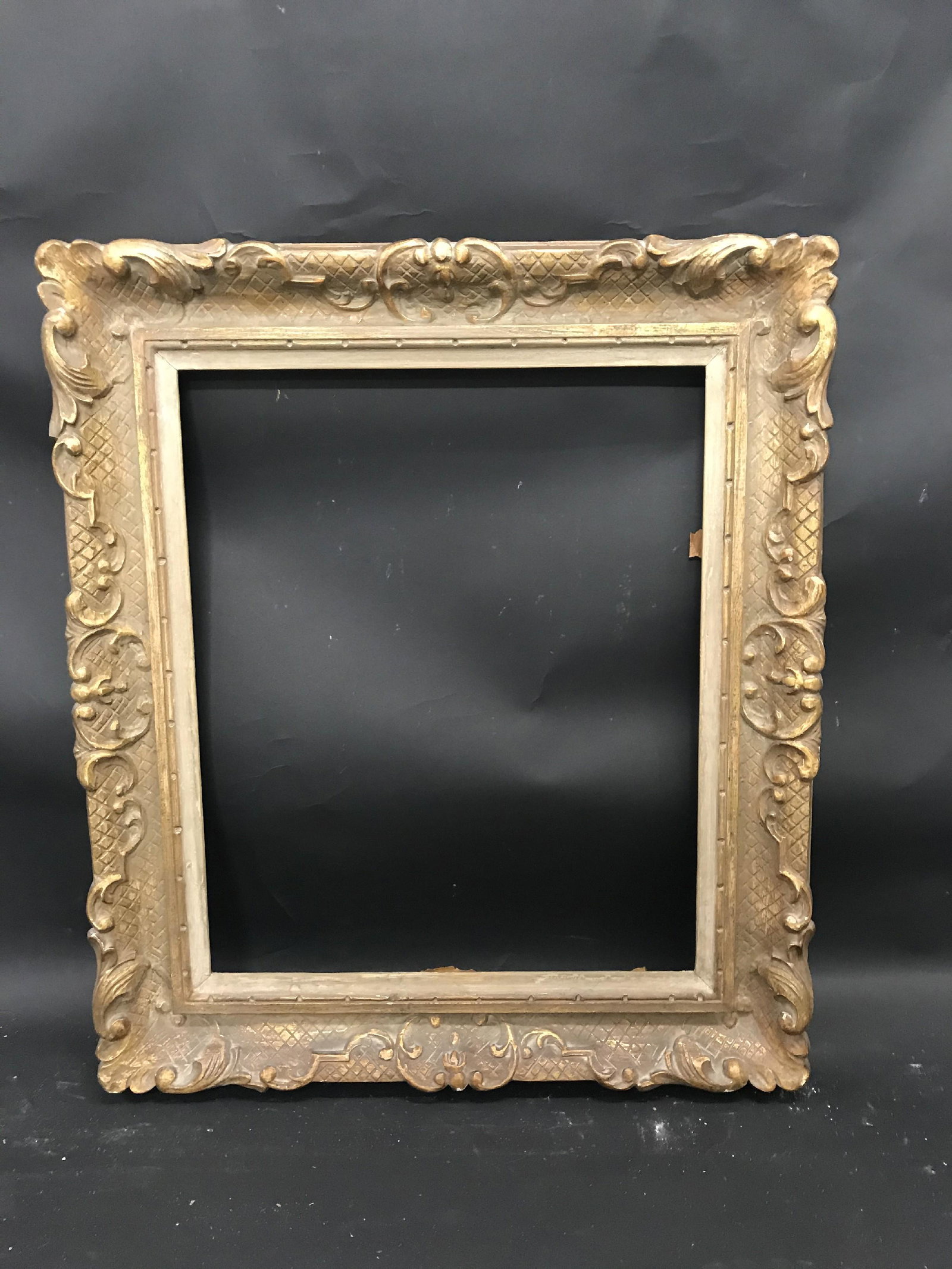 20th Century English School. A Carved Giltwood Frame,: 20th Century English School. A Carved Giltwood Frame, with white slip, 18" x 15" (rebate).