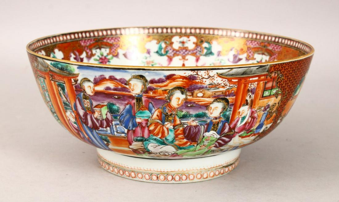 A GOOD CHINESE 18TH CENTURY QIANLONG MANDARIN FAMILLE: A GOOD CHINESE 18TH CENTURY QIANLONG MANDARIN FAMILLE ROSE PORCELAIN BOWL, decorated with scenes of figures in landscapes, 25.5cm diameter.