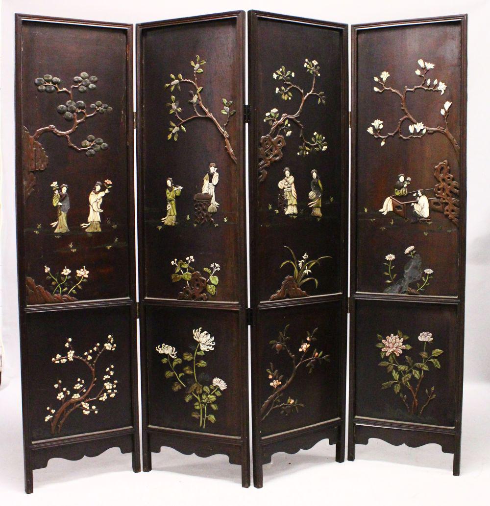 A 19TH CENTURY CHINESE HARDWOOD AND INLAID FOUR FOLD: A 19TH CENTURY CHINESE HARDWOOD AND INLAID FOUR FOLD SCREEN, each panel inlaid with carved bone and wood to depict figures in garden settings, each panel 175cm high x 45cm wide.