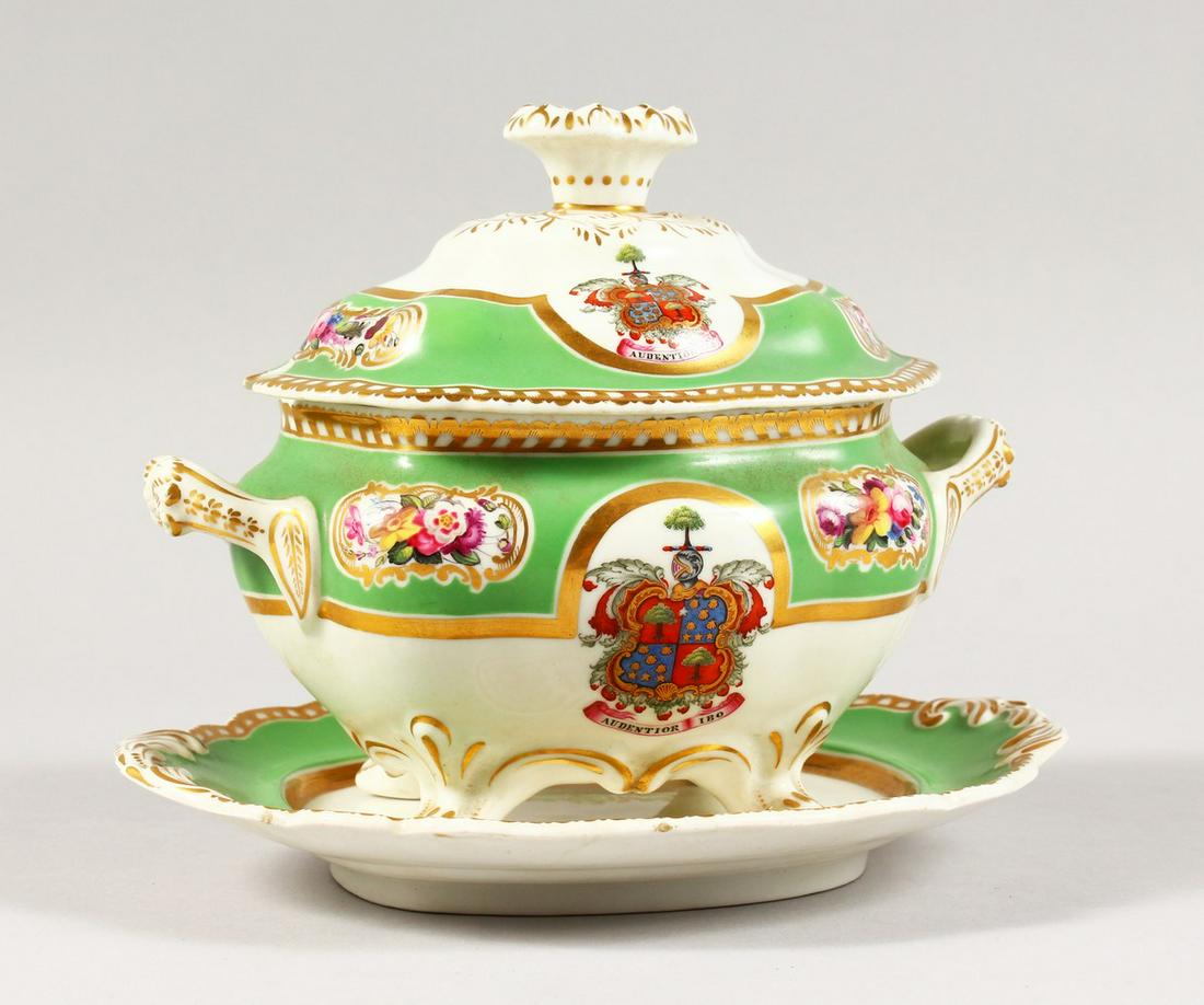A CHAMBERLAINS WORCESTER OVAL TUREEN, COVER AND STAND,: A CHAMBERLAINS WORCESTER OVAL TUREEN, COVER AND STAND, with apple green ground, painted with flowers and crest AUDENTIOR IBO. Printed mark. No. 455. New Bond Street, London. 8ins long.