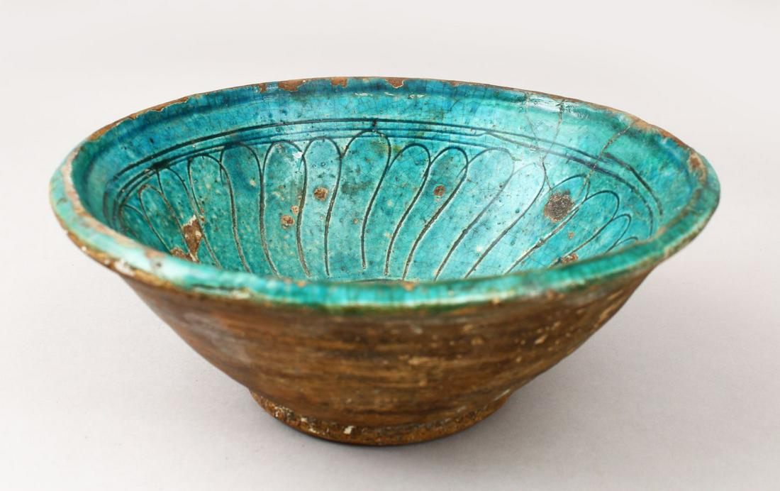 AN ISLAMIC POSSIBLY KASHAN GLAZED TURQUOISE POTTERY (1 of 4)