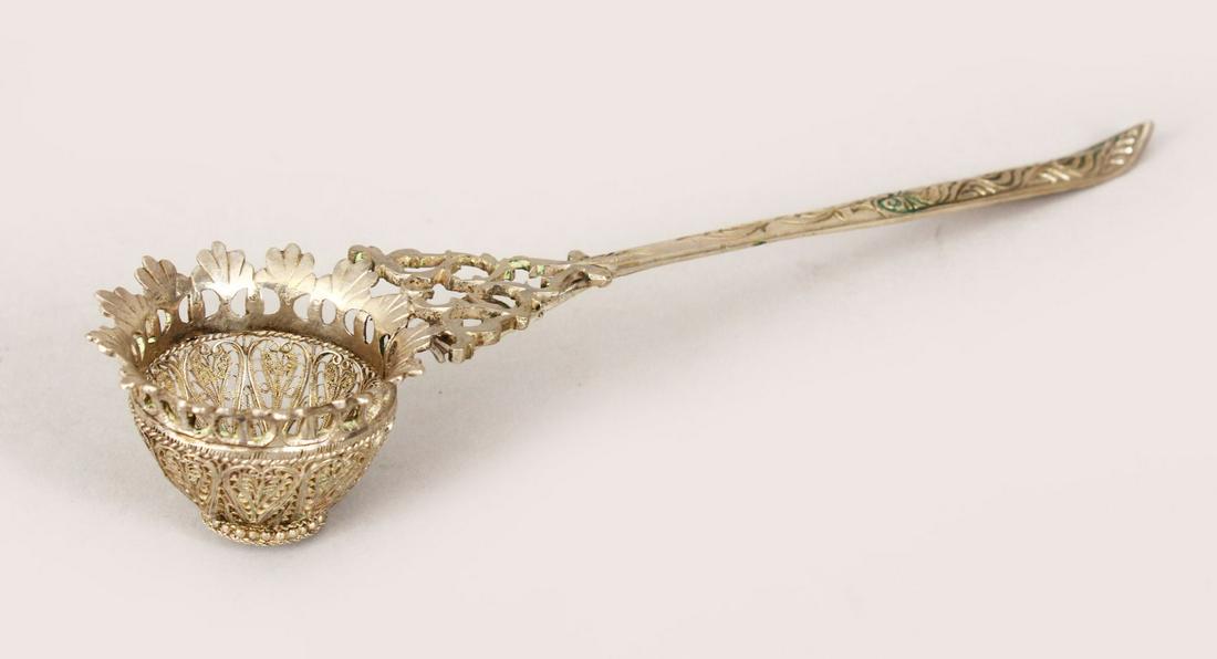 A 19TH CENTURY INDIAN SILVER FILIGREE TEA STRAINER, (1 of 3)