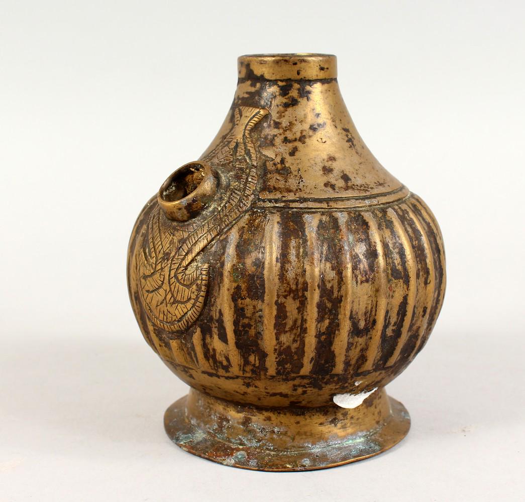 A 18TH CENTURY MUGHAL BRASS HUQQA BASE, with a ribbed (1 of 7)