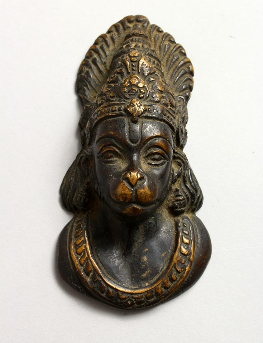 A 19TH CENTURY OR EARLIER INDIAN TIBETAN BRONZE FIGURE: A 19TH CENTURY OR EARLIER INDIAN TIBETAN BRONZE FIGURE OF A DEITY / DOG GOD, 13.5CM HIGH.