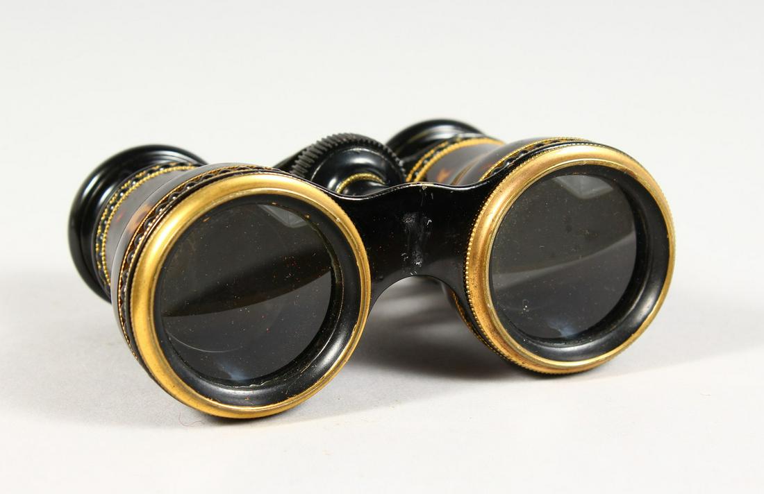 A PAIR OF TORTOISESHELL OPERA GLASSES by L. K. Leon &: A PAIR OF TORTOISESHELL OPERA GLASSES by L. K. Leon & Co Opticians, 167 Piccadilly, London.