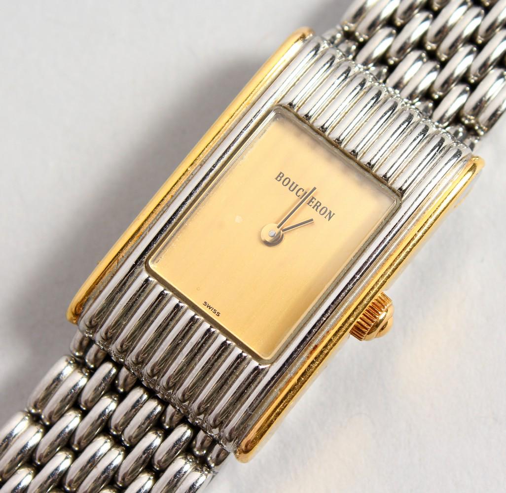 A BOUCHERON WHITE AND GOLD COLOURED STEEL WRISTWATCH,: A BOUCHERON WHITE AND GOLD COLOURED STEEL WRISTWATCH, No. AH 30861, in a blue BOUCHERON box.