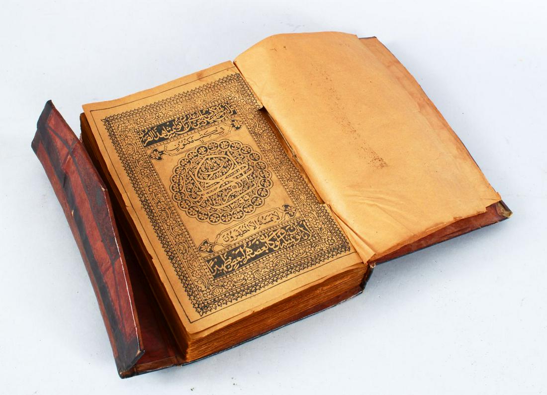 A GOOD 19TH CENTURY ISLAMIC LEATHER-BOUND BOOK OF QURAN (1 of 8)