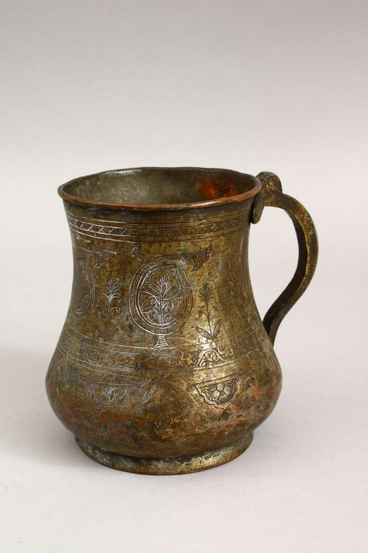 A GOOD PERSIAN ISLAMIC TINNED COPPER TANKARD, with (1 of 6)