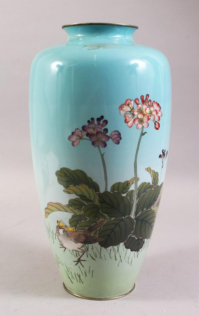 A JAPANESE MEIJI PERIOD GINBARI CLOISONNE VASE, the: A JAPANESE MEIJI PERIOD GINBARI CLOISONNE VASE, the body of the vase with a native display of flora, (AF) 37cm high X 20cm wide.