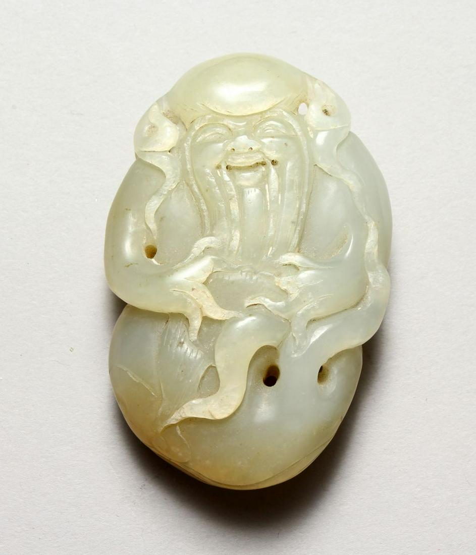 A GOOD CHINESE CARVED JADE PEBBLE OF SHOU LAO, the (1 of 7)
