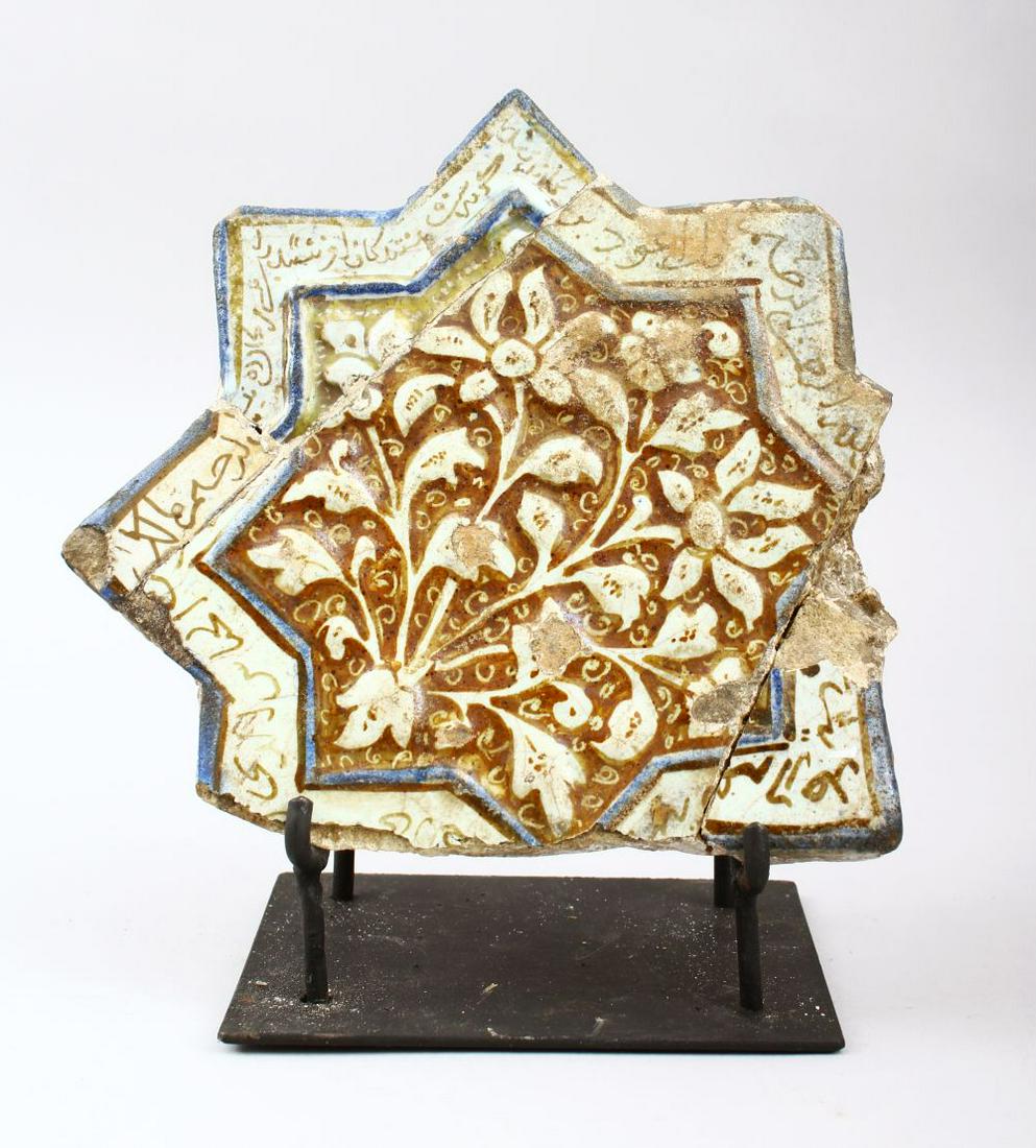 AN EARLY ISLAMIC KASHAN STAR TILE on a metal stand, (1 of 7)