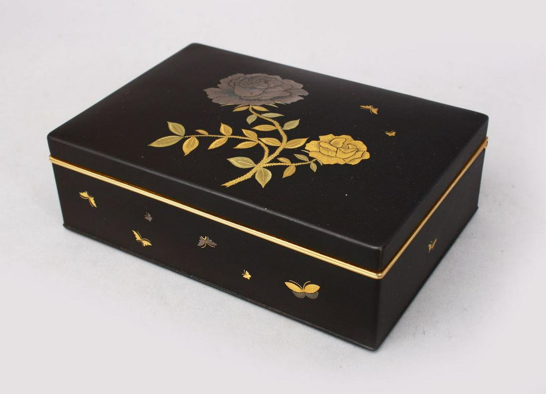 A GOOD JAPANESE MEIJI / TAISHO PERIOD KOMAI STYLE IRON: A GOOD JAPANESE MEIJI / TAISHO PERIOD KOMAI STYLE IRON BOX - FLOWERS, the iron box decorated with scenes of gold and silver damascened native flora, the box hinged, the interior with a gilt lining and