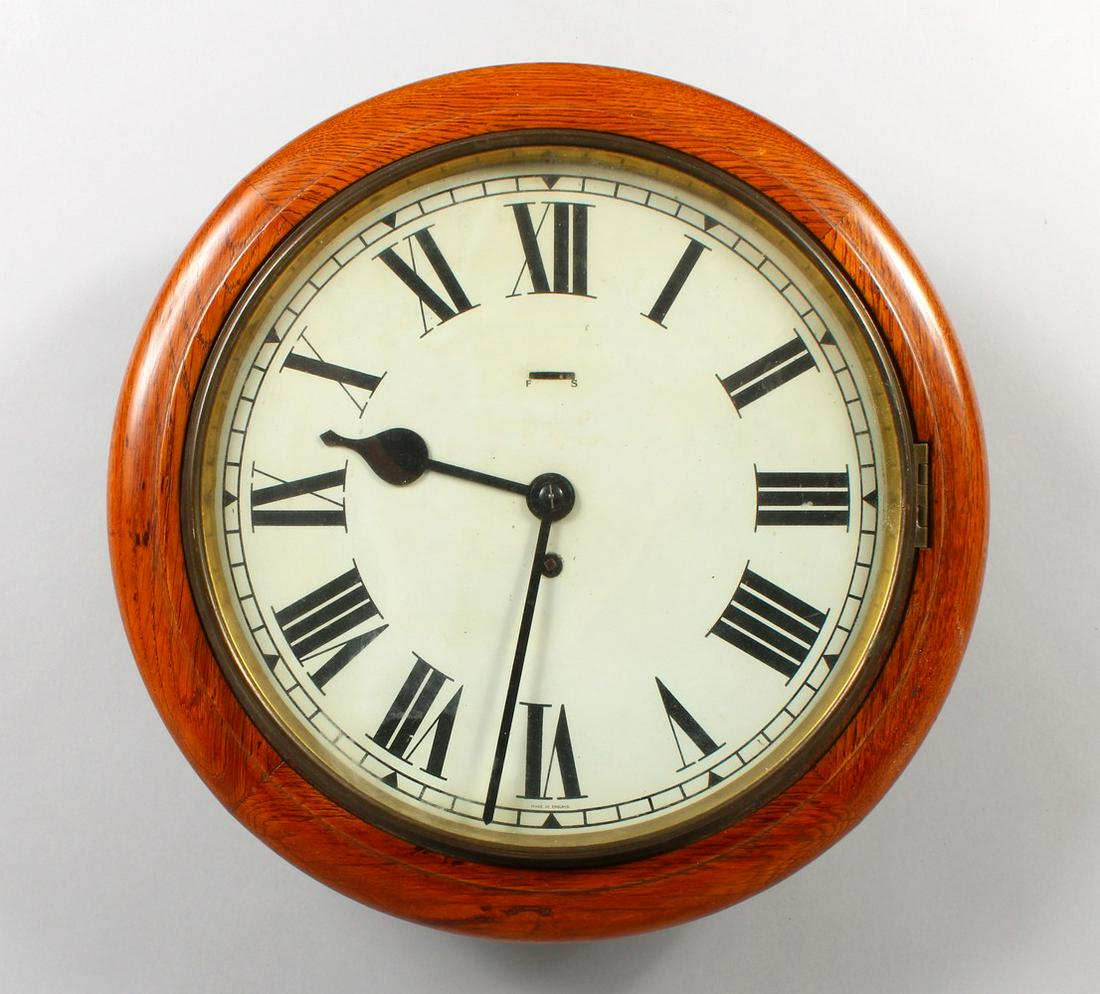 A GOOD 19TH CENTURY OAK CASED CIRCULAR 11-INCH WALL: A GOOD 19TH CENTURY OAK CASED CIRCULAR 11-INCH WALL CLOCK.