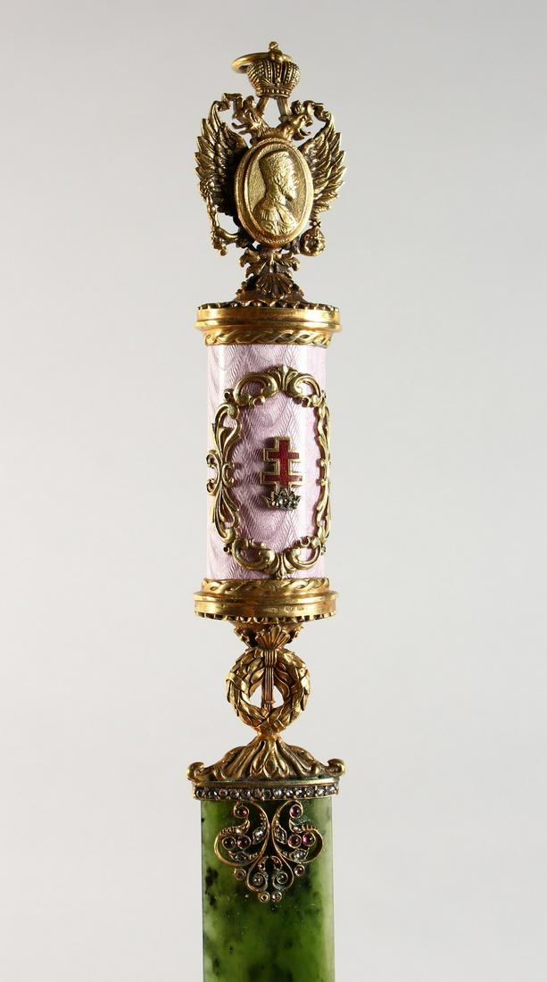 A GOOD RUSSIAN GREEN ONYX, GOLD AND ENAMEL PAPER KNIFE: A GOOD RUSSIAN GREEN ONYX, GOLD AND ENAMEL PAPER KNIFE IN THE STYLE OF FABERGE, set with diamonds. 11ins long, in a wooden box.