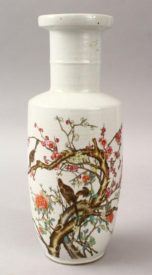 A 20TH CENTURY CHINESE FAMILLE ROSE PORCELAIN ROULEAU: A 20TH CENTURY CHINESE FAMILLE ROSE PORCELAIN ROULEAU VASE, decorated with scenes of birds amongst native flora, with chinese calligraphy and a six character mark, 27cm high.