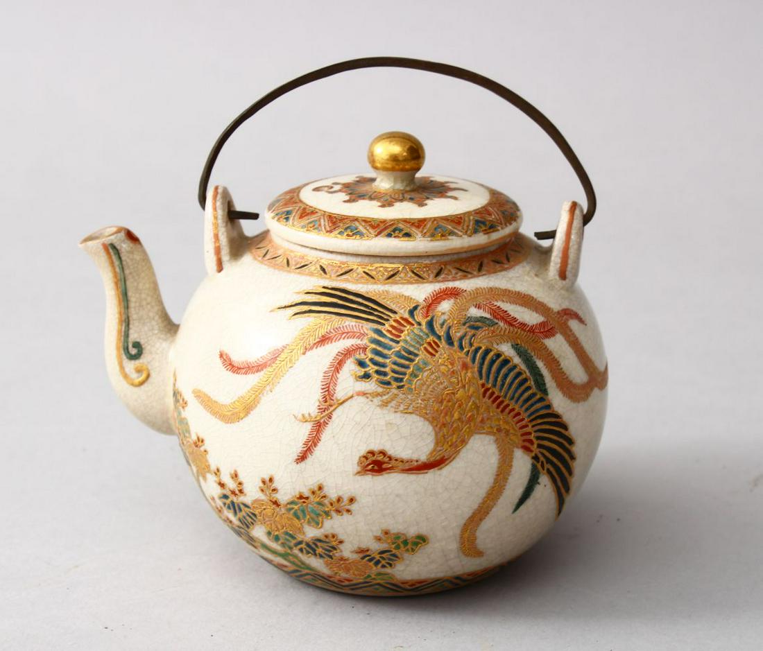 A GOOD JAPANESE MEIJI PERIOD SATSUMA TEAPOT & COVER,: A GOOD JAPANESE MEIJI PERIOD SATSUMA TEAPOT & COVER, the body of the pot decorated with scenes of a Ho-Ho bird in flight amongst native flora, 8cm high x 11cm.
