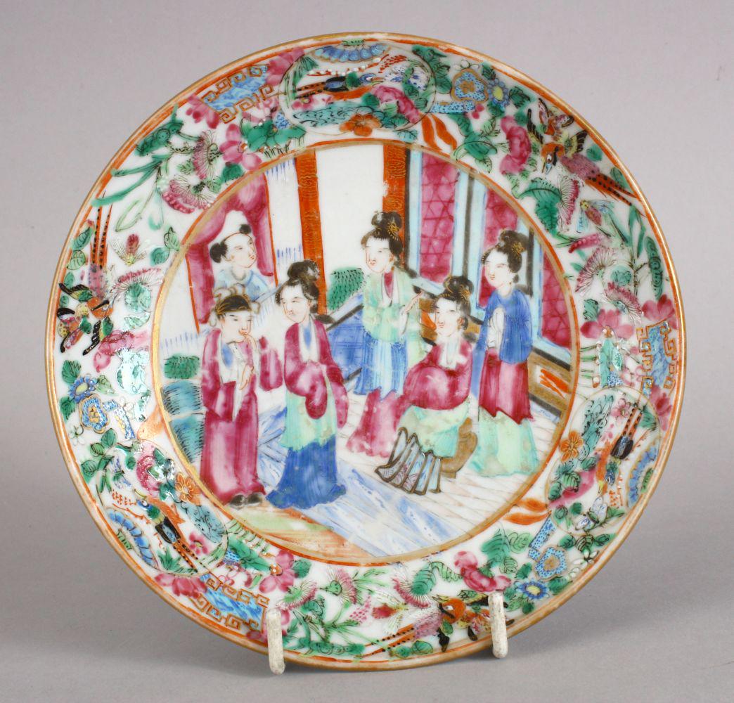 A GOOD EARLY 19TH CENTURY CHINESE CANTON FAMILLE ROSE: A GOOD EARLY 19TH CENTURY CHINESE CANTON FAMILLE ROSE PORCELAIN DISH, decorated with ladies and children in an interior setting, 15cm.