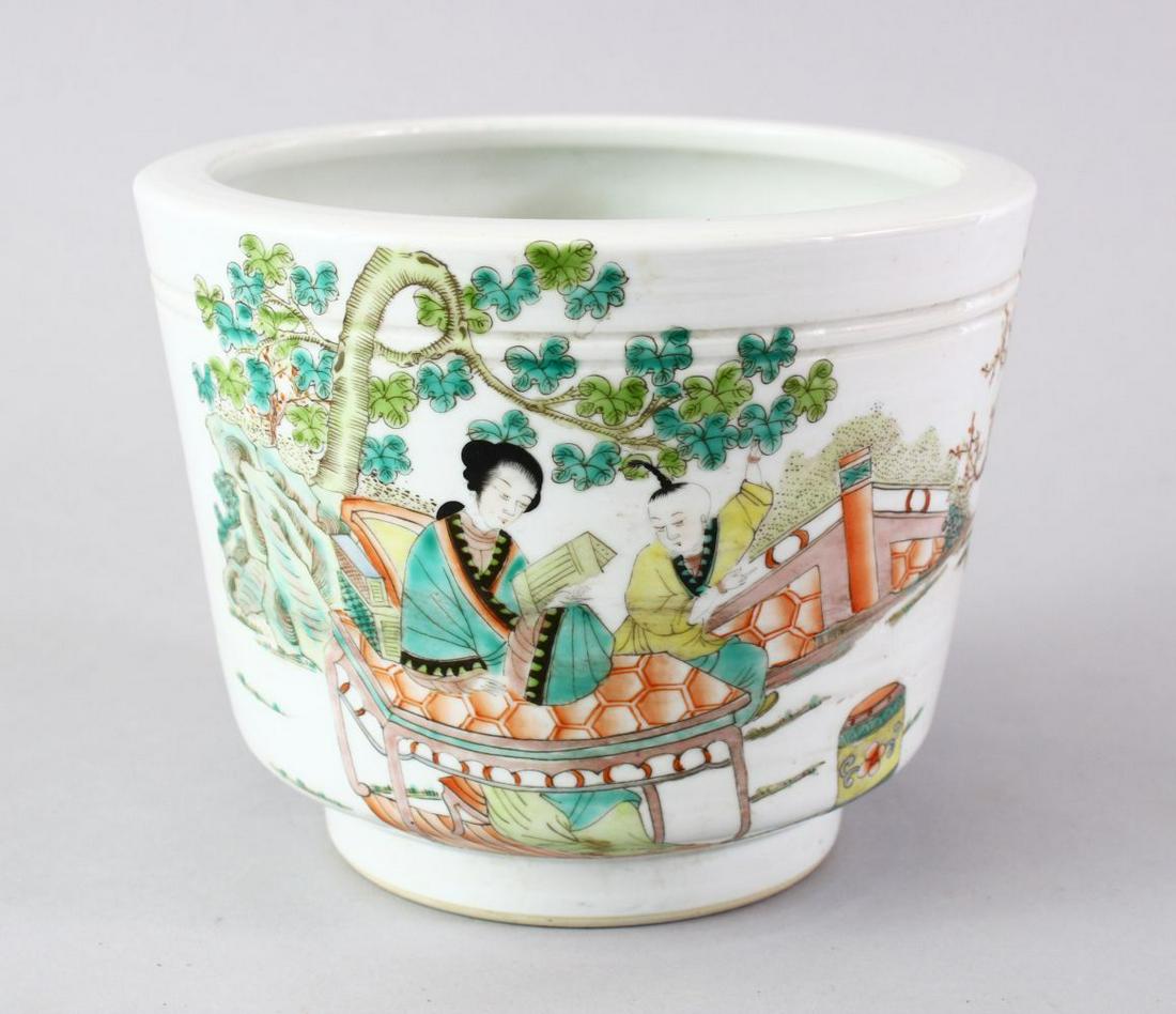 A GOOD CHINESE REPUBLIC PERIOD STYLE FAMILLE ROSE BRUSH: A GOOD CHINESE REPUBLIC PERIOD STYLE FAMILLE ROSE BRUSH WASH, the body of the pot decorated with scenes of woman and child in landscapes, the verso with calligraphy, 15cm high x 18cm wide.