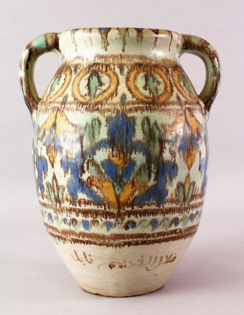 A LARGE NORTH AFRICAN TWIN HANDLE SIGNED POTTERY JAR, (1 of 7)