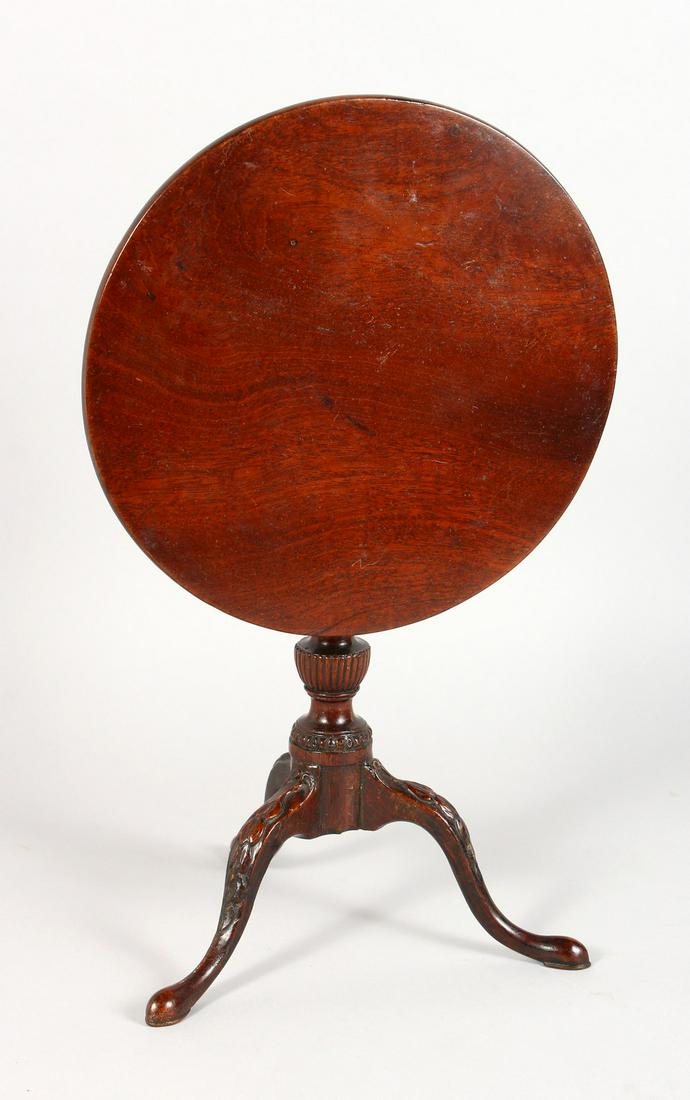 A VERY GOOD APPRENTICE/MINIATURE MAHOGANY CIRCULAR TILT: A VERY GOOD APPRENTICE/MINIATURE MAHOGANY CIRCULAR TILT TOP TRIPOD TABLE, possibly George III period, plain top on a turned and carved vase shaped column, the curving legs carved with harebells, termi