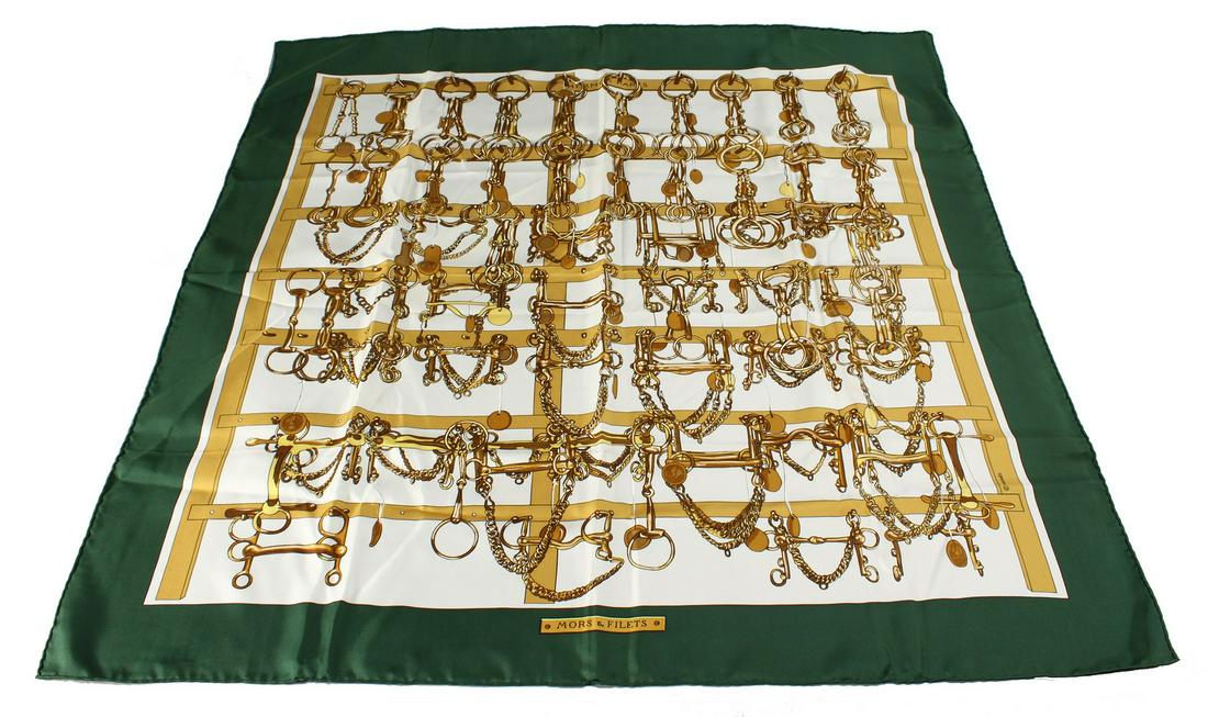 A HERMES SILK SCARF, "Mors & Filets", boxed.: A HERMES SILK SCARF, "Mors & Filets", boxed.