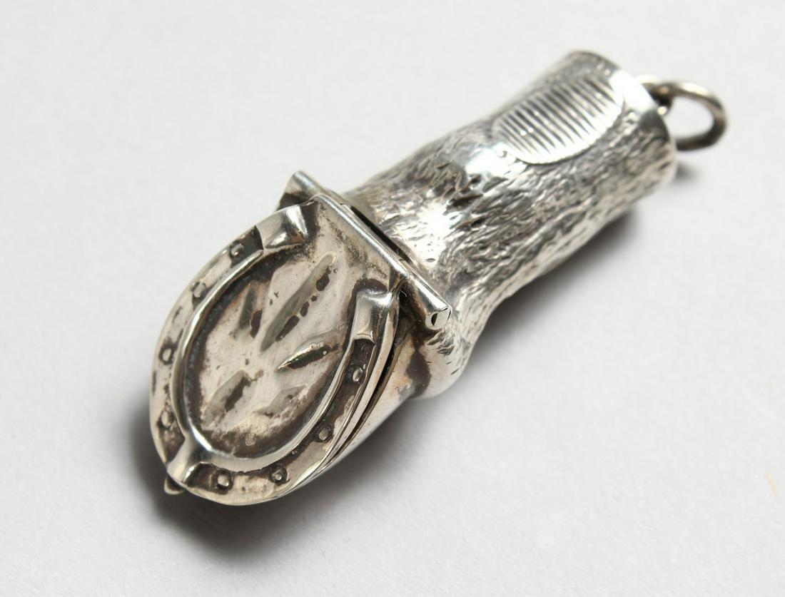 A NOVELTY SILVER HORSES HEAD PIN CUSHION. 2ins long.: A NOVELTY SILVER HORSES HEAD PIN CUSHION. 2ins long.