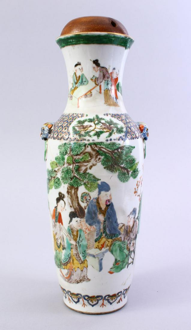 A 18TH / 19TH CENTURY CHINESE FAMILLE VERTE PORCELAIN: A 18TH / 19TH CENTURY CHINESE FAMILLE VERTE PORCELAIN VASE / LAMP, the body of the vase decorated with scenes of figures in landscape settings, with twin moulded lion handles, an ruyi border decoratio