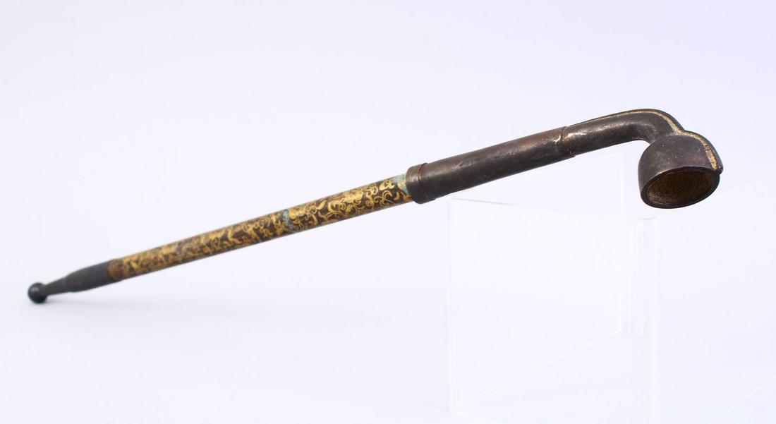 A LARGE CHINESE METAL AND GILT OPIUM PIPE, with gilt (1 of 4)