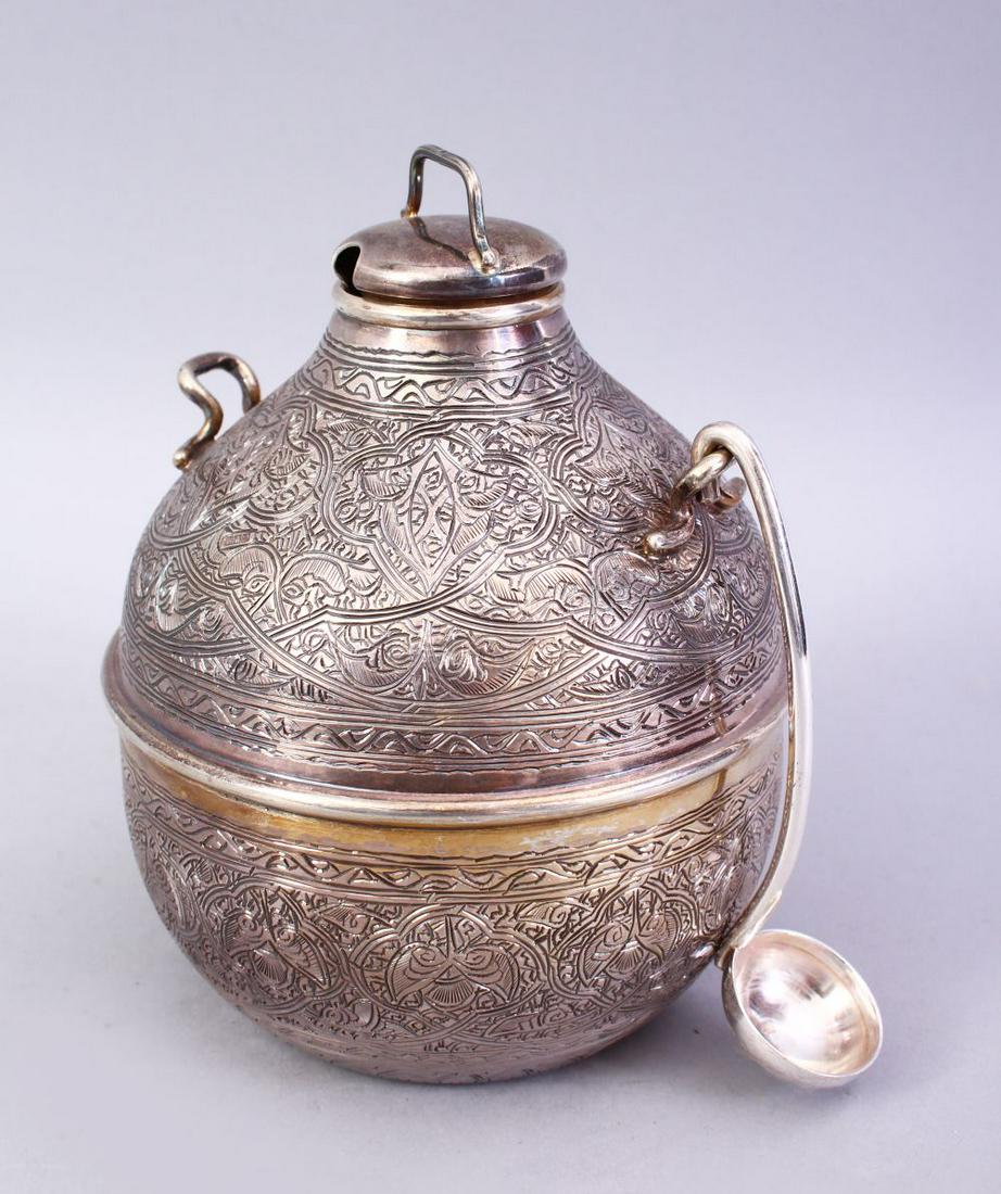 A GOOD 19TH CENTURY IRANIAN / ISLAMIC SILVER TEA CADDY: A GOOD 19TH CENTURY IRANIAN / ISLAMIC SILVER TEA CADDY WITH SPOON, the body of the caddy carved with formal floral motif, the top with a lid, hall mared interior, and the base, the spoon also marked, 