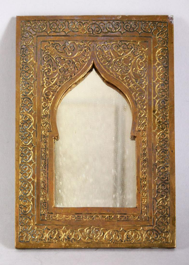A GOOD 19TH CENTURY ISLAMIC MOROCCAN BRASS FRAMED: A GOOD 19TH CENTURY ISLAMIC MOROCCAN BRASS FRAMED MIRROR, 17cm x 11cm.