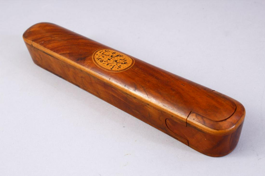 A GOOD ISLAMIC OLIVE WOOD CALLIGRAPHIC PEN BOX, the top (1 of 3)