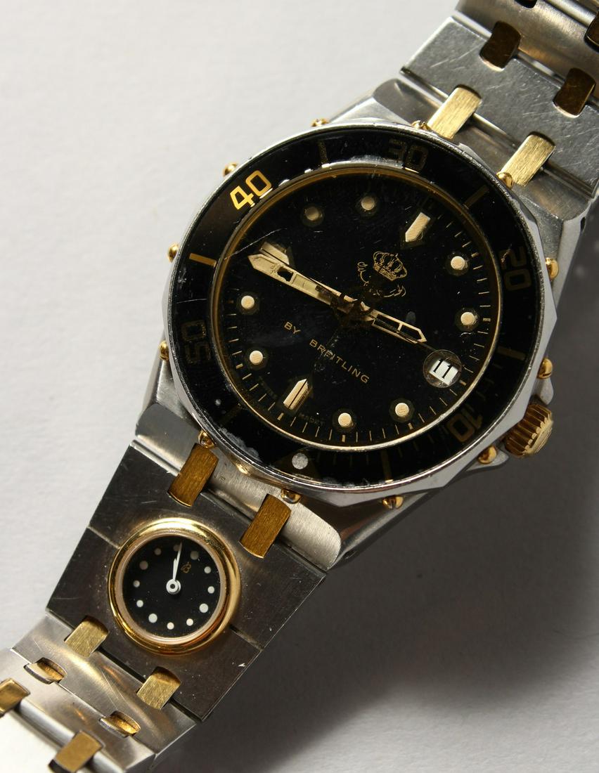 A GENTLEMAN'S GOOD BREITLING WRISTWATCH with a tiny: A GENTLEMAN'S GOOD BREITLING WRISTWATCH with a tiny dial on the strap.