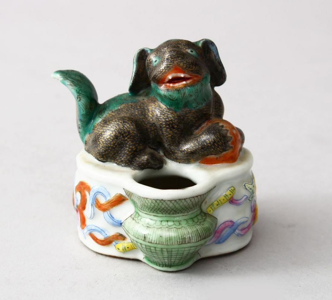 A GOOD 19TH CENTURY CHINESE FAMILLE ROSE PORCELAIN: A GOOD 19TH CENTURY CHINESE FAMILLE ROSE PORCELAIN BRUSH WASHER - LION DOG, the brush wash with a seated lion dog and ball, the opening at the front, the sided decorated with precious object decoratio