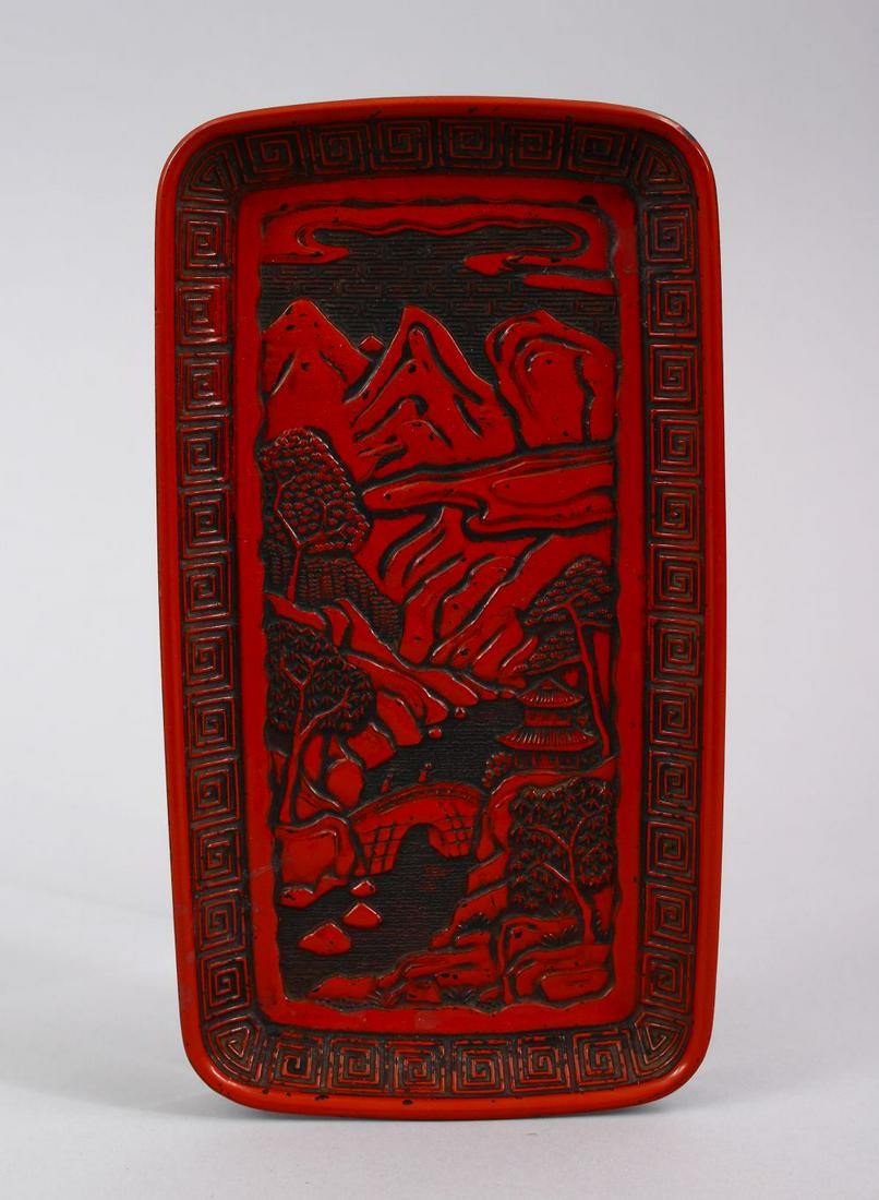 A 20TH CENTURY CHINESE CINNABAR LACQUER TRAY, with (1 of 2)