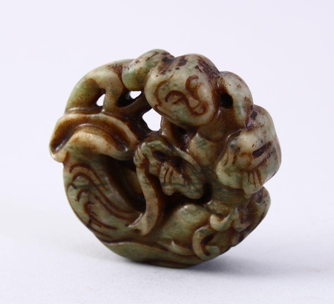 A GOOD CHINESE CARVED JADE ROUNDEL PENDANT OF GUANYIN, (1 of 5)