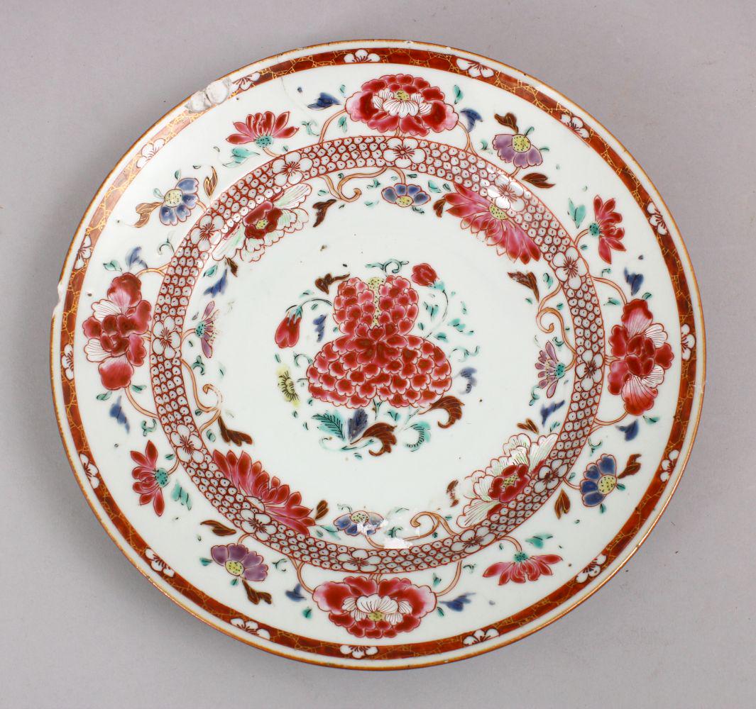 A CHINESE 18TH CENTURY FAMILLE ROSE PORCELAIN PLATE,: A CHINESE 18TH CENTURY FAMILLE ROSE PORCELAIN PLATE, with poly chrome floral decoration, 22.5cm. (af)