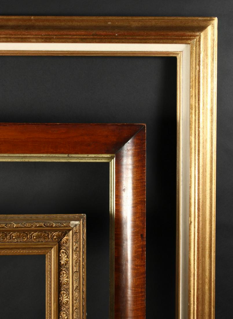 A 19th Century Maple Frame, 27" x 22" - 68.5cm x 56cm,: A 19th Century Maple Frame, 27" x 22" - 68.5cm x 56cm, along with an early 20th Century Gilt Composition Frame, 20" x 25" - 50.75cm x 63.5cm, and a Modern Frame. (3). (Rebate Size)