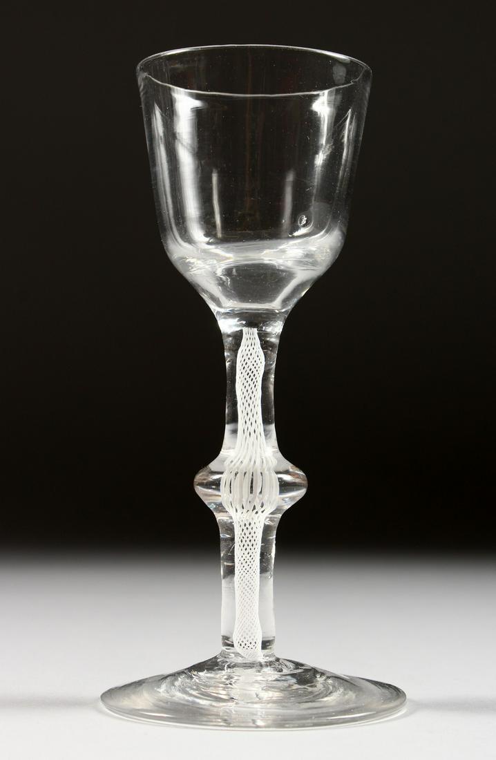 A GEORGIAN WINE GLASS with plain bowl, knop in the stem: A GEORGIAN WINE GLASS with plain bowl, knop in the stem and white twist. 5.25ins high.
