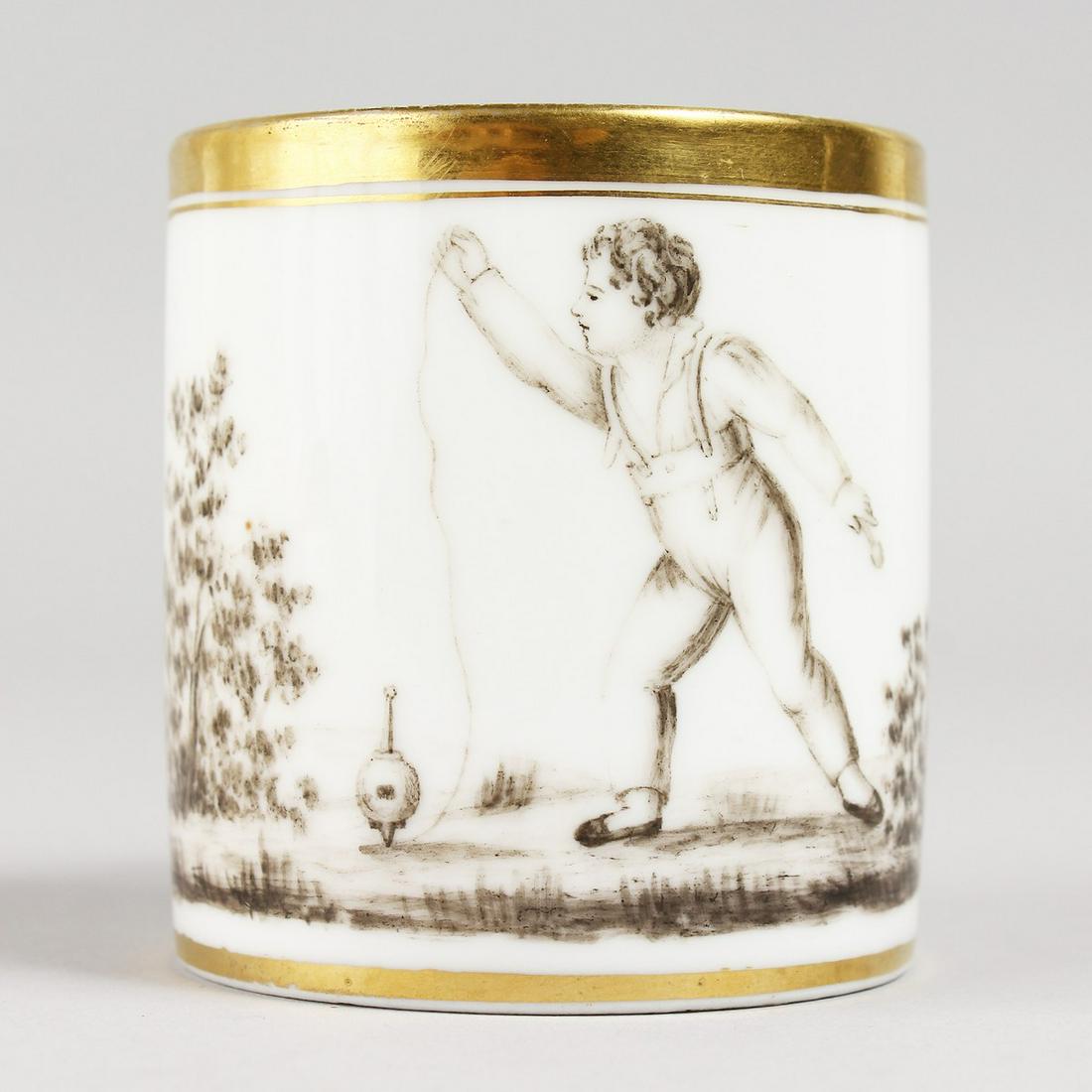 A 19TH CENTURY PARIS COFFEE CAN, painted in sepia with: A 19TH CENTURY PARIS COFFEE CAN, painted in sepia with a boy playing with a spinning top.