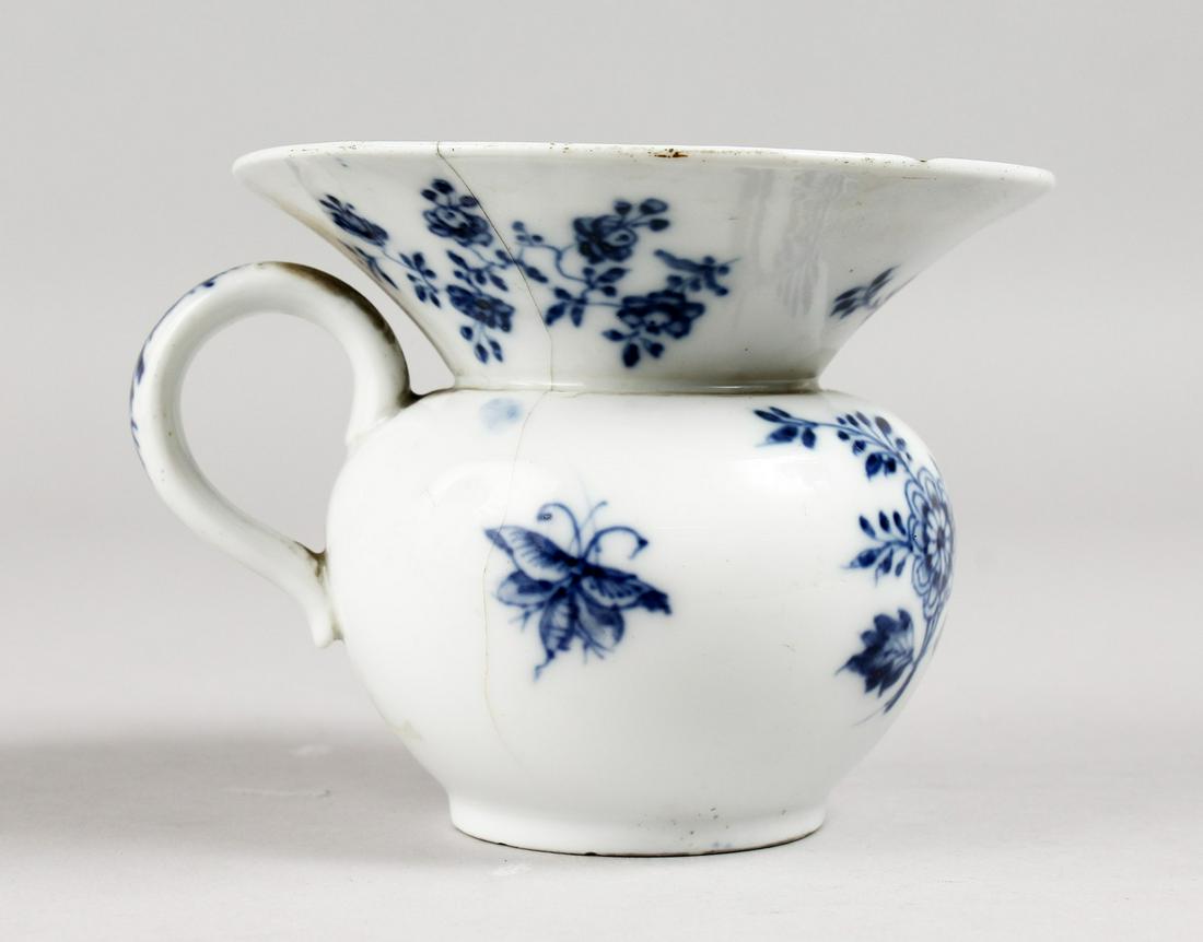 AN 18TH CENTURY MEISSEN BLUE AND WHITE SPITTOON. Cross: AN 18TH CENTURY MEISSEN BLUE AND WHITE SPITTOON. Cross swords mark in blue. 3.5ins high.