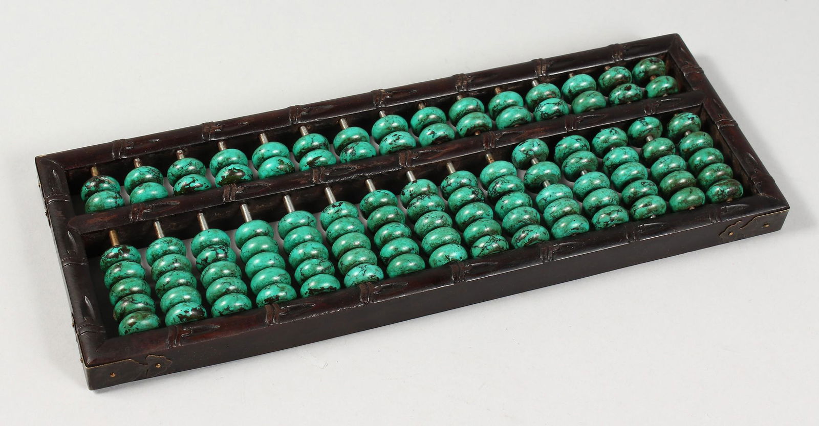 A CHINESE MALACHITE BEAD ABACUS. 14.5ins long.: A CHINESE MALACHITE BEAD ABACUS. 14.5ins long.